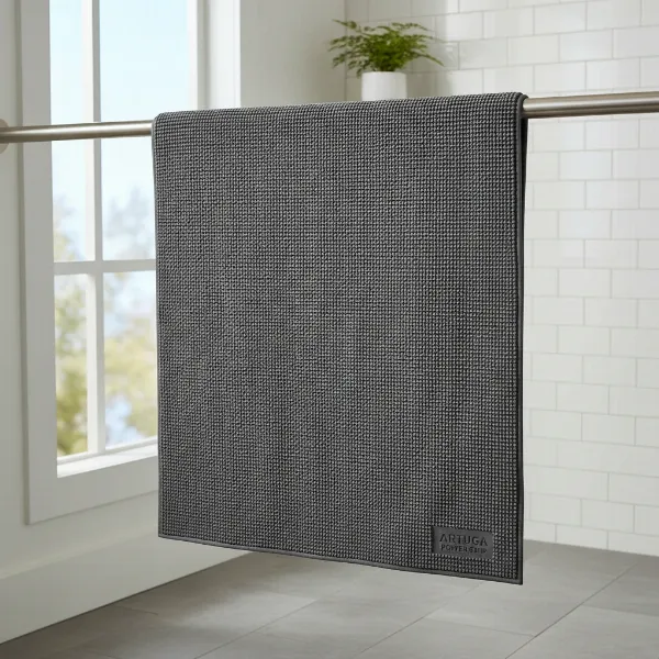 An Artuga Power Grip Mat air drying properly, demonstrating essential cleaning and care.